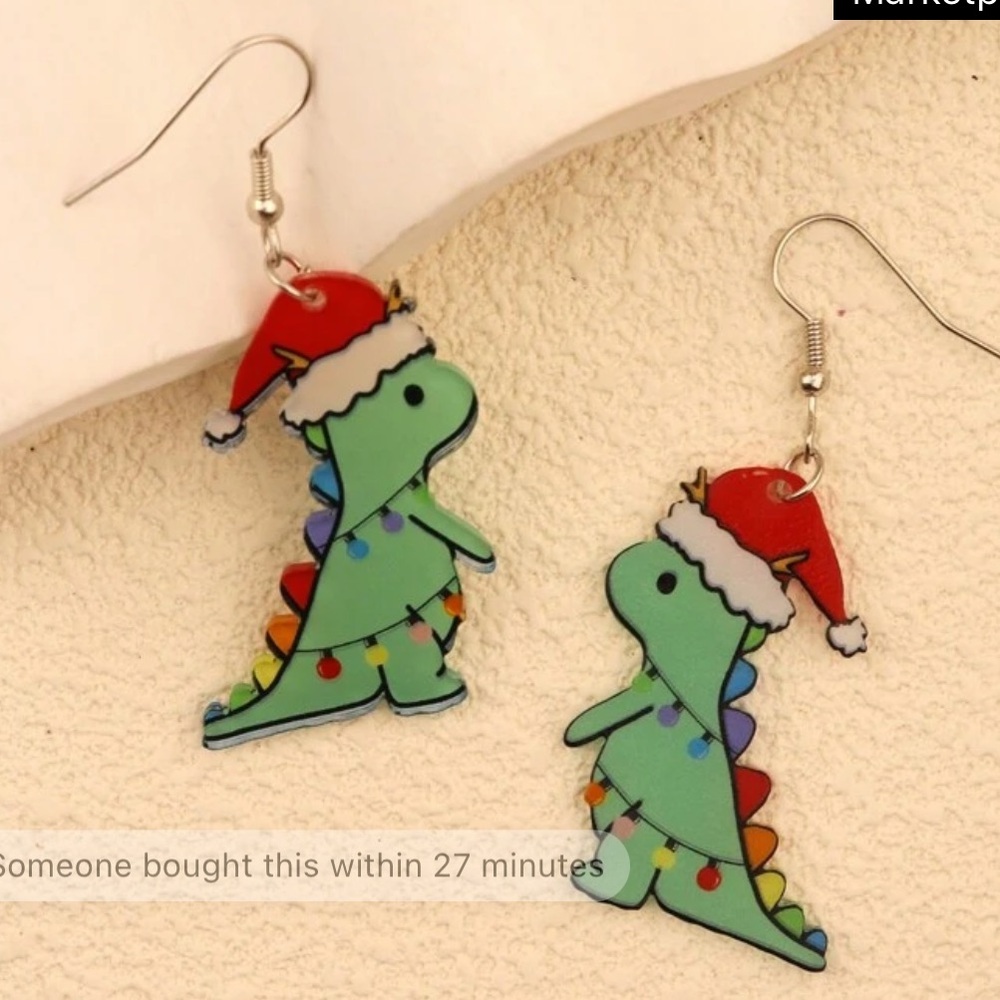 New! SHEIN Christmas Dinosaur earrings.